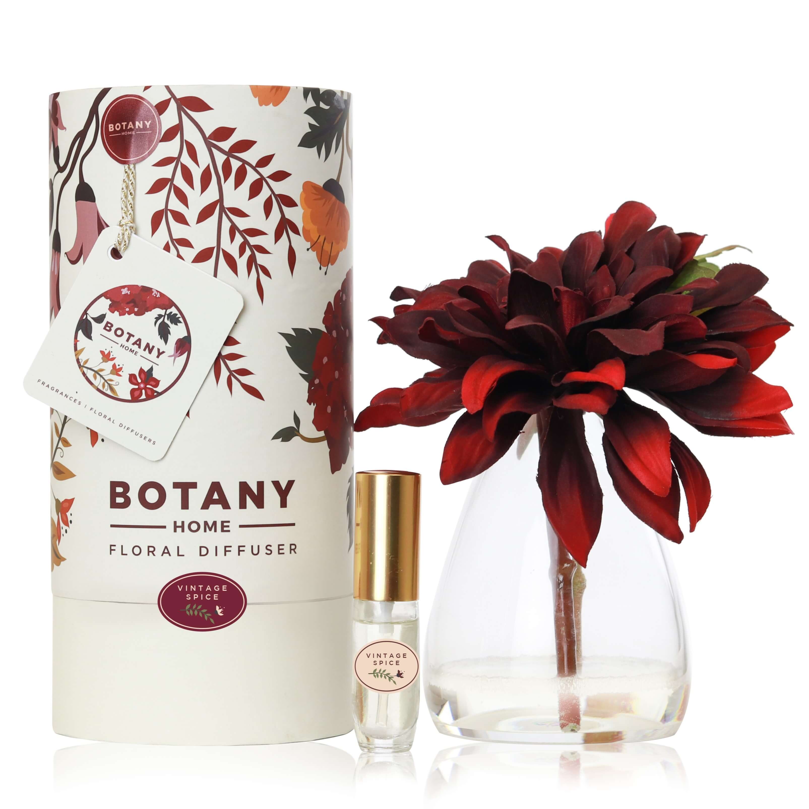 An artificial burgundy Dahlia flower arrangement paired with a floral scent spray