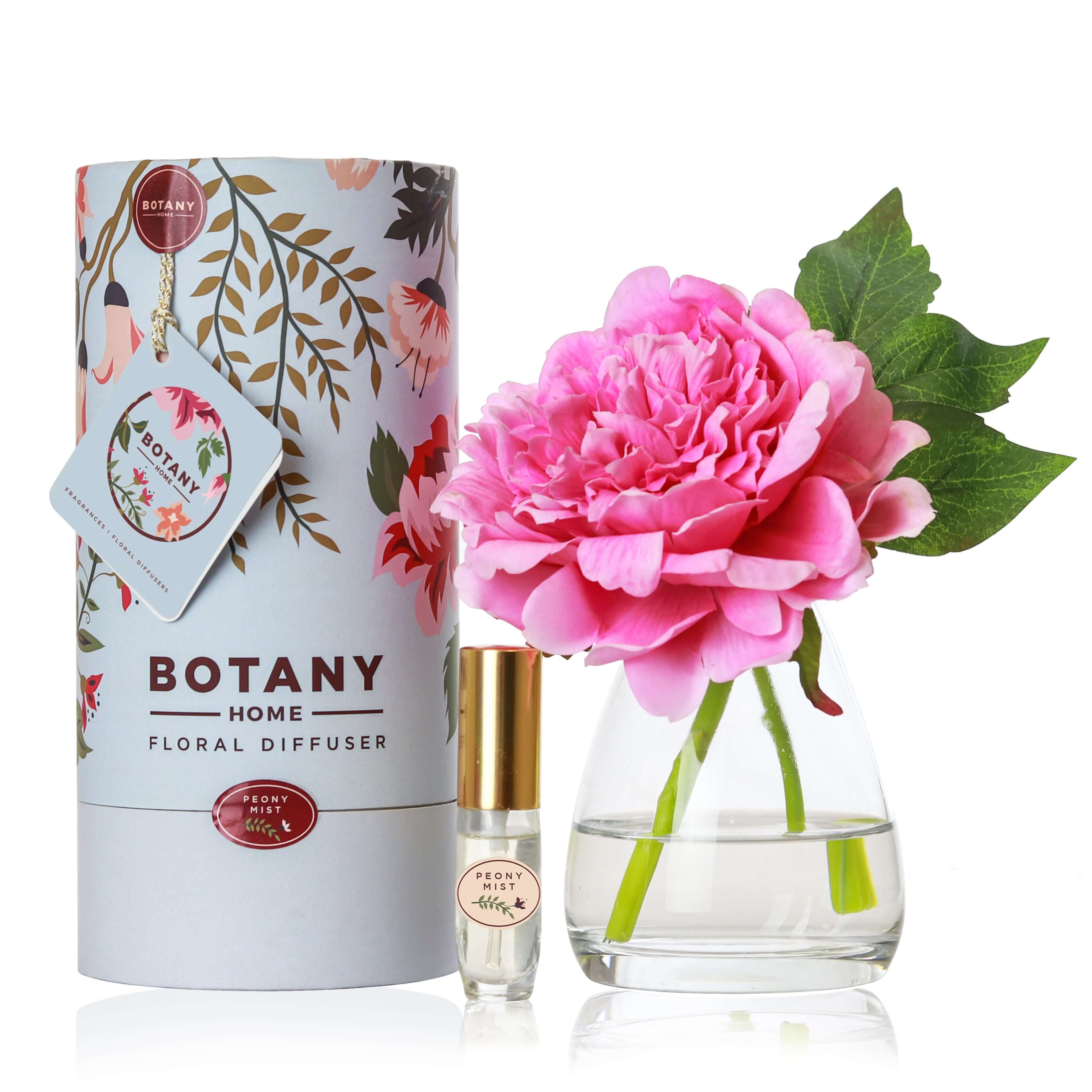An artificial light pink Peony flower arrangement paired with a floral scent spray