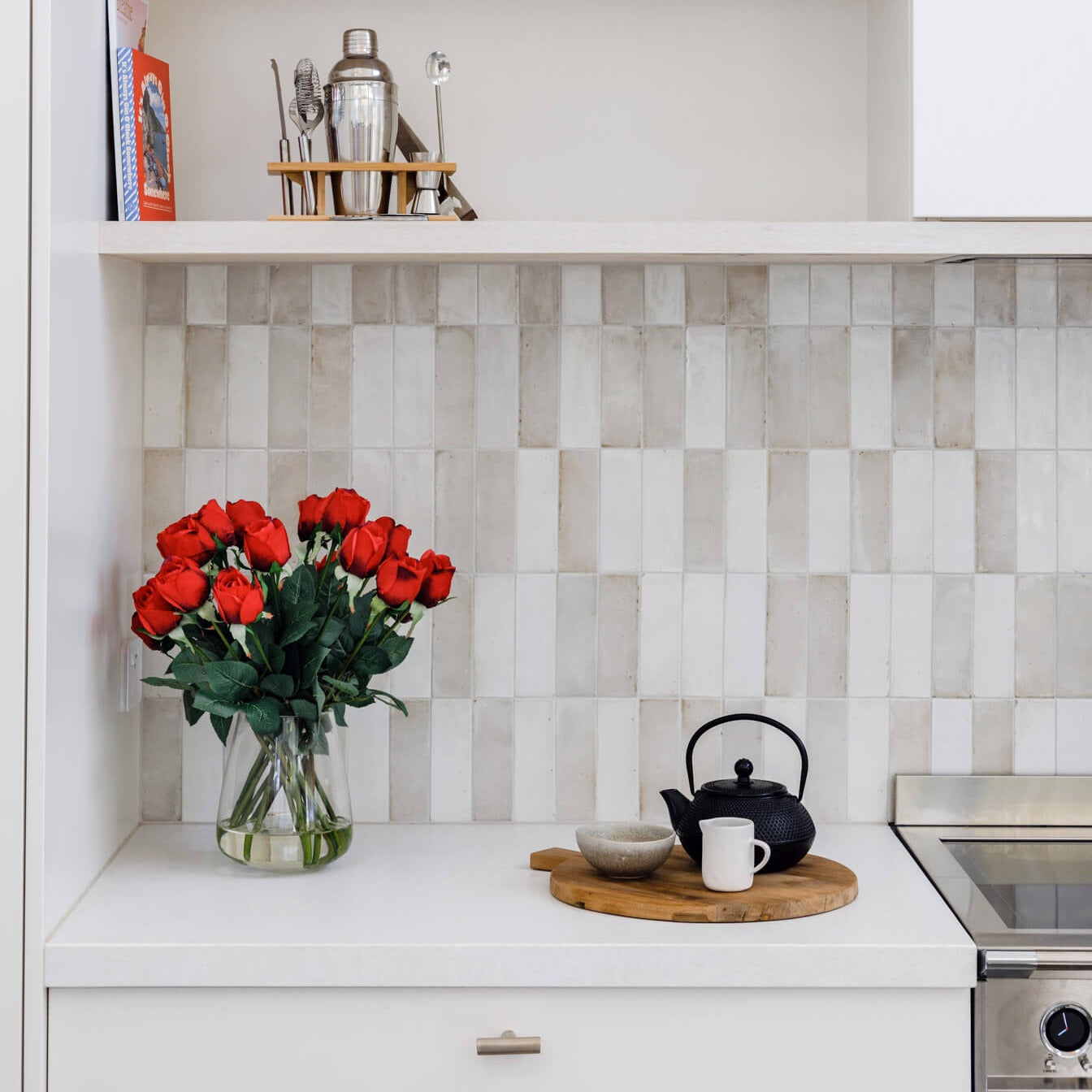 Silk rose bunch positioned in a kitchen