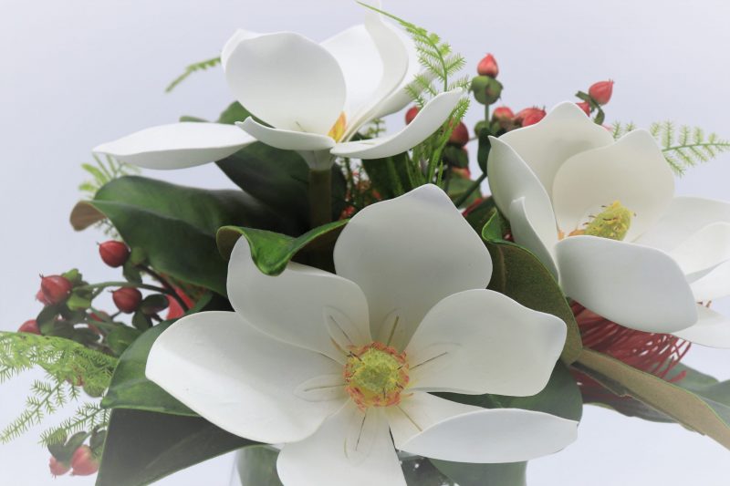 Fake magnolia flower arrangement