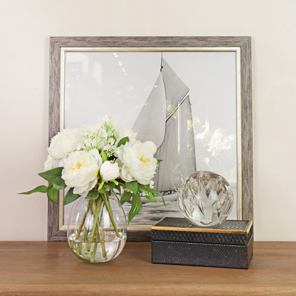 Tall artificial flower arrangement