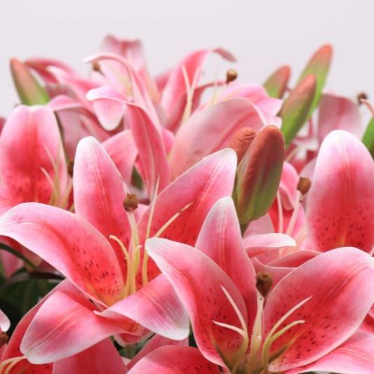 Artificial pink lily flower arrangement