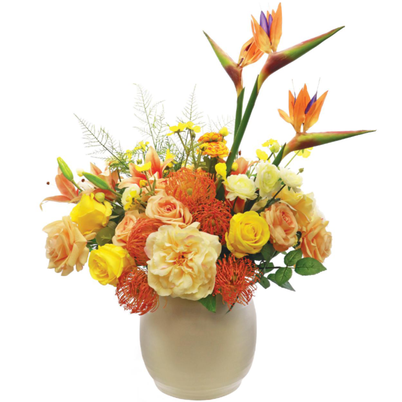Large mix of artificial flowers set in a ceramic pot