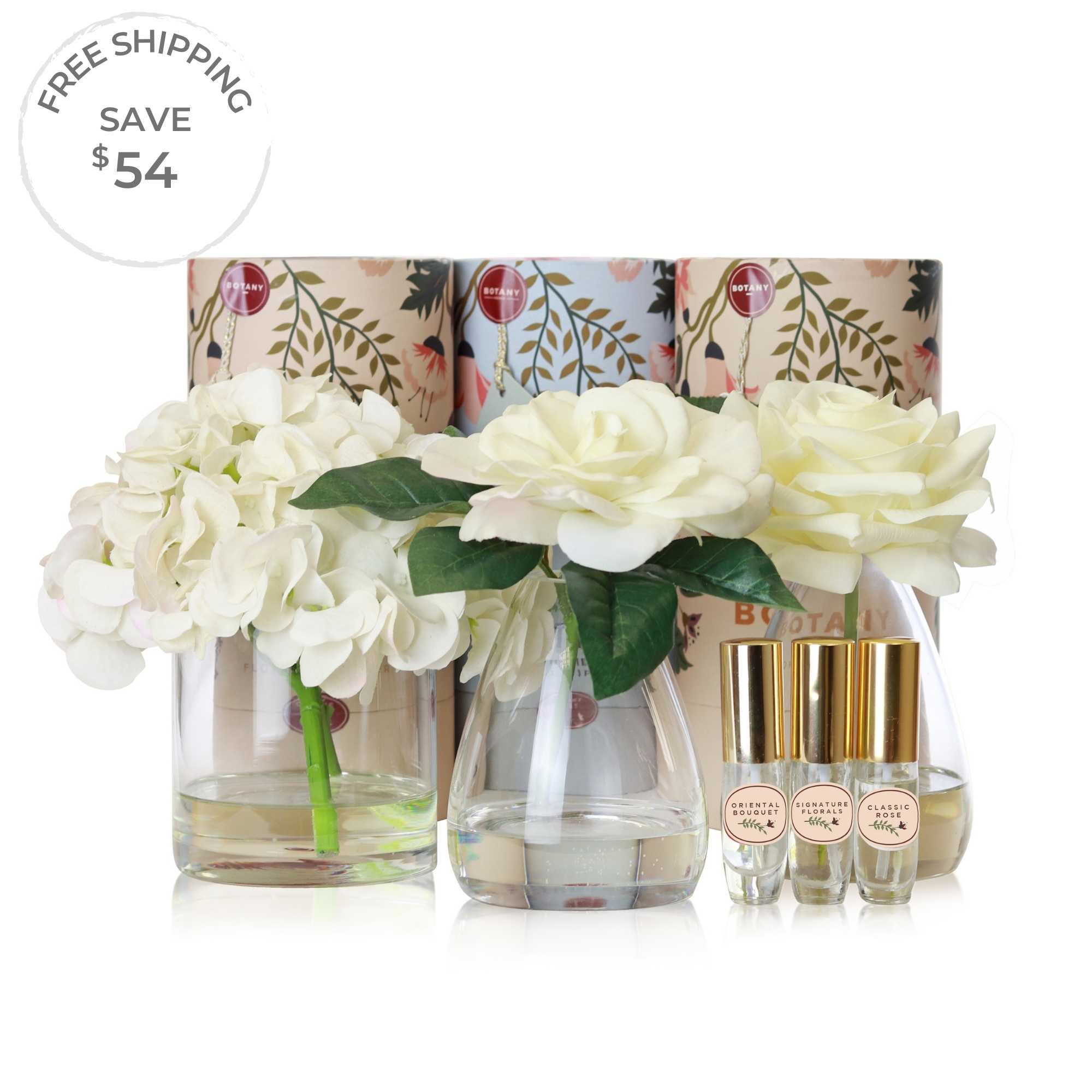 A set of 3 artificial white flower arrangements with accompanying floral scent sprays sold as a set of 3