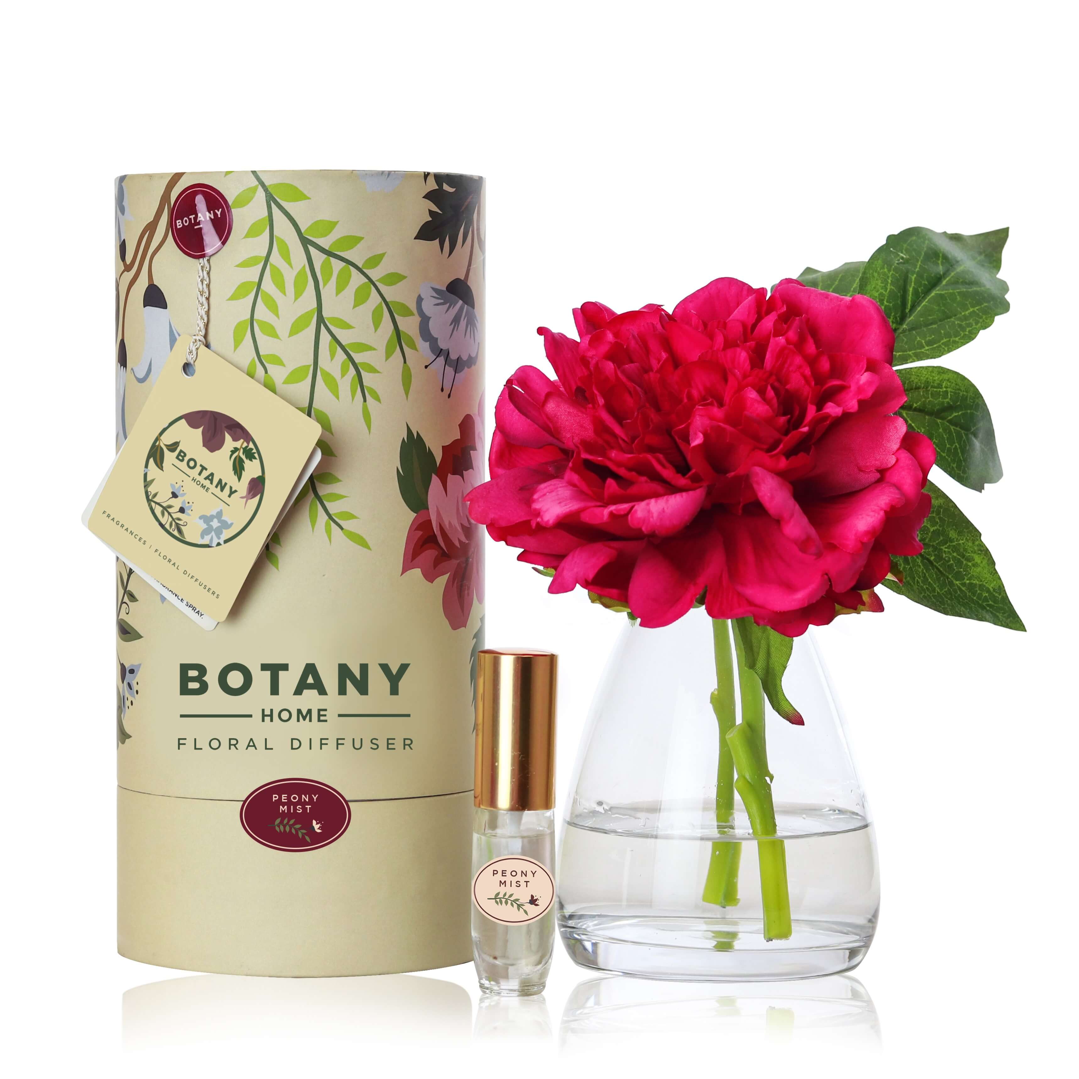 An artificial dark pink Peony flower arrangement paired with a floral scent spray