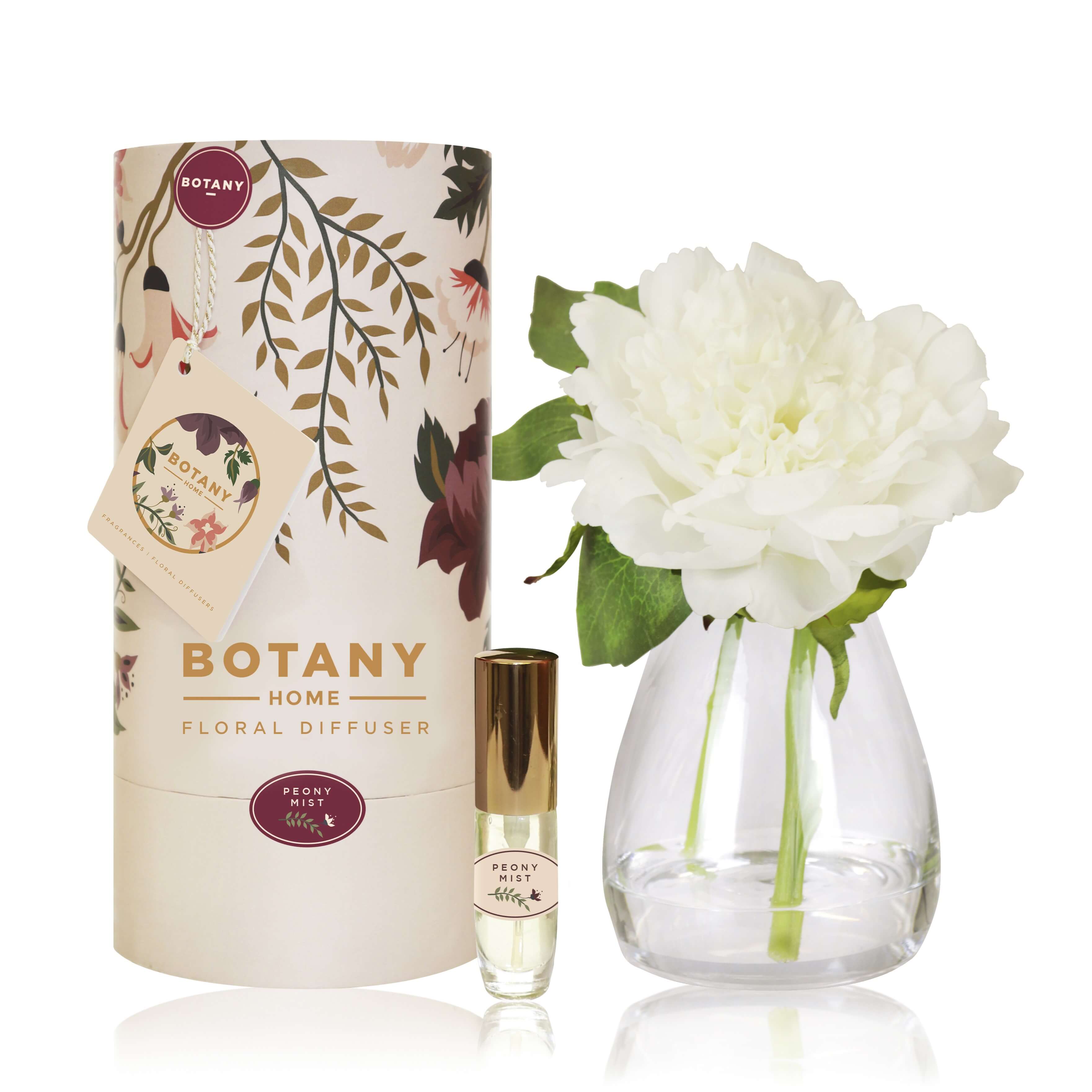 An artificial white Peony flower arrangement paired with a floral scent spray
