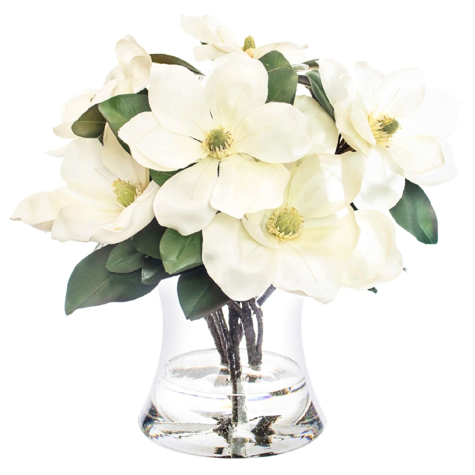 Fake white Magnolia flowers set in shaped vase