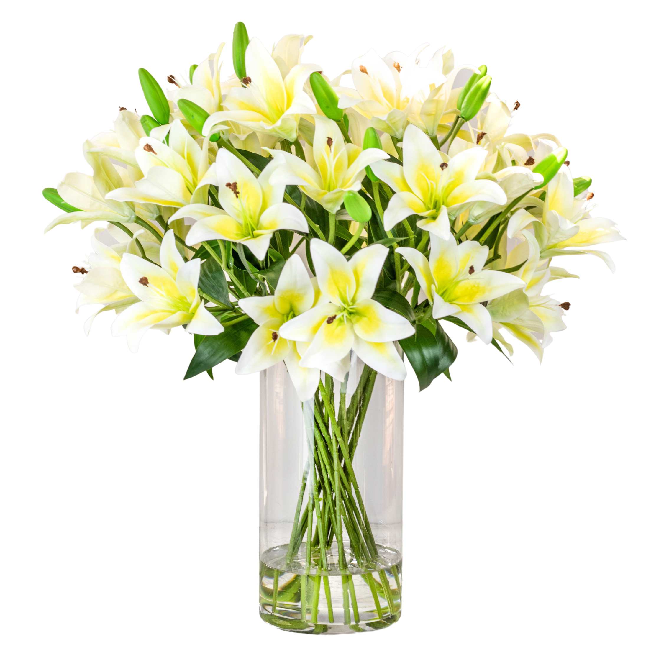 Artificial white lily arrangement set in a tall glass vase