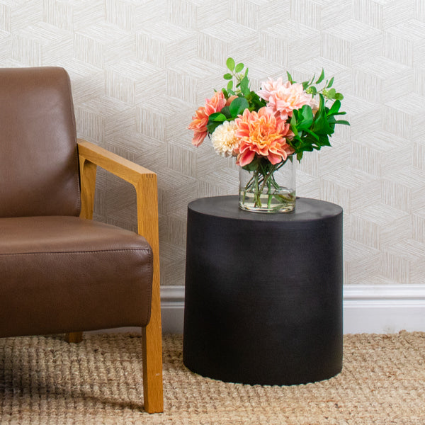 silk flower arrangement positioned on a side table