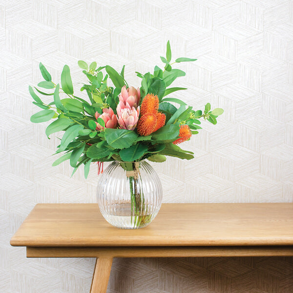 fake flower arrangement on a table