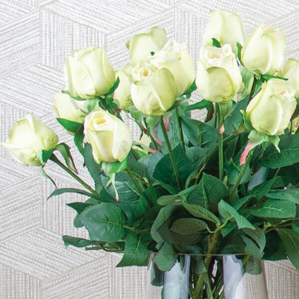 silk roses set in a glass vase