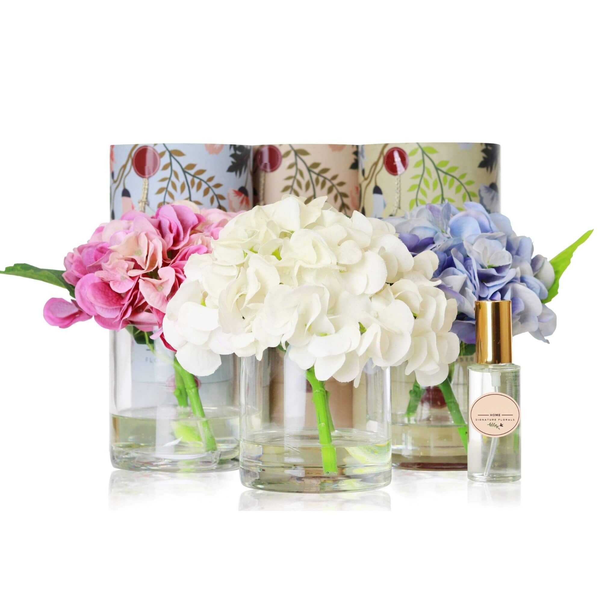 A set of 3 artificial hydrangea arrangements sold as a bundle paired with floral fragrances