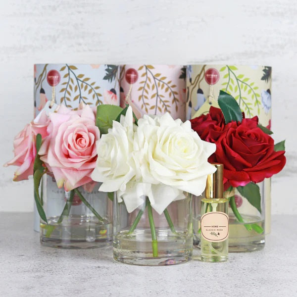 Fake rose arrangements with perfume spray