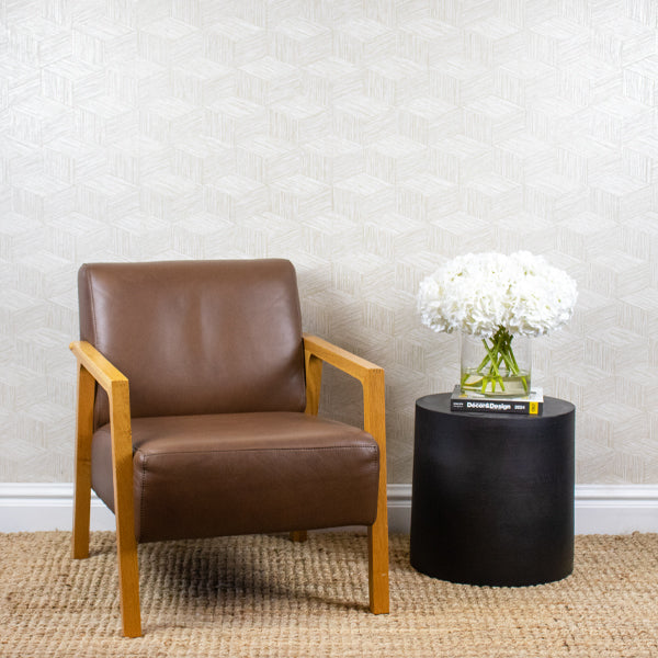 Artificial hydrangea flower arrangement positioned on a side table