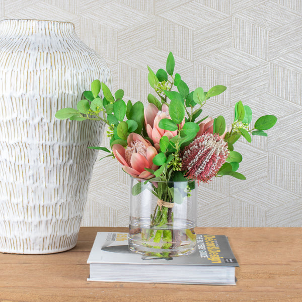 silk flower arrangement on a table