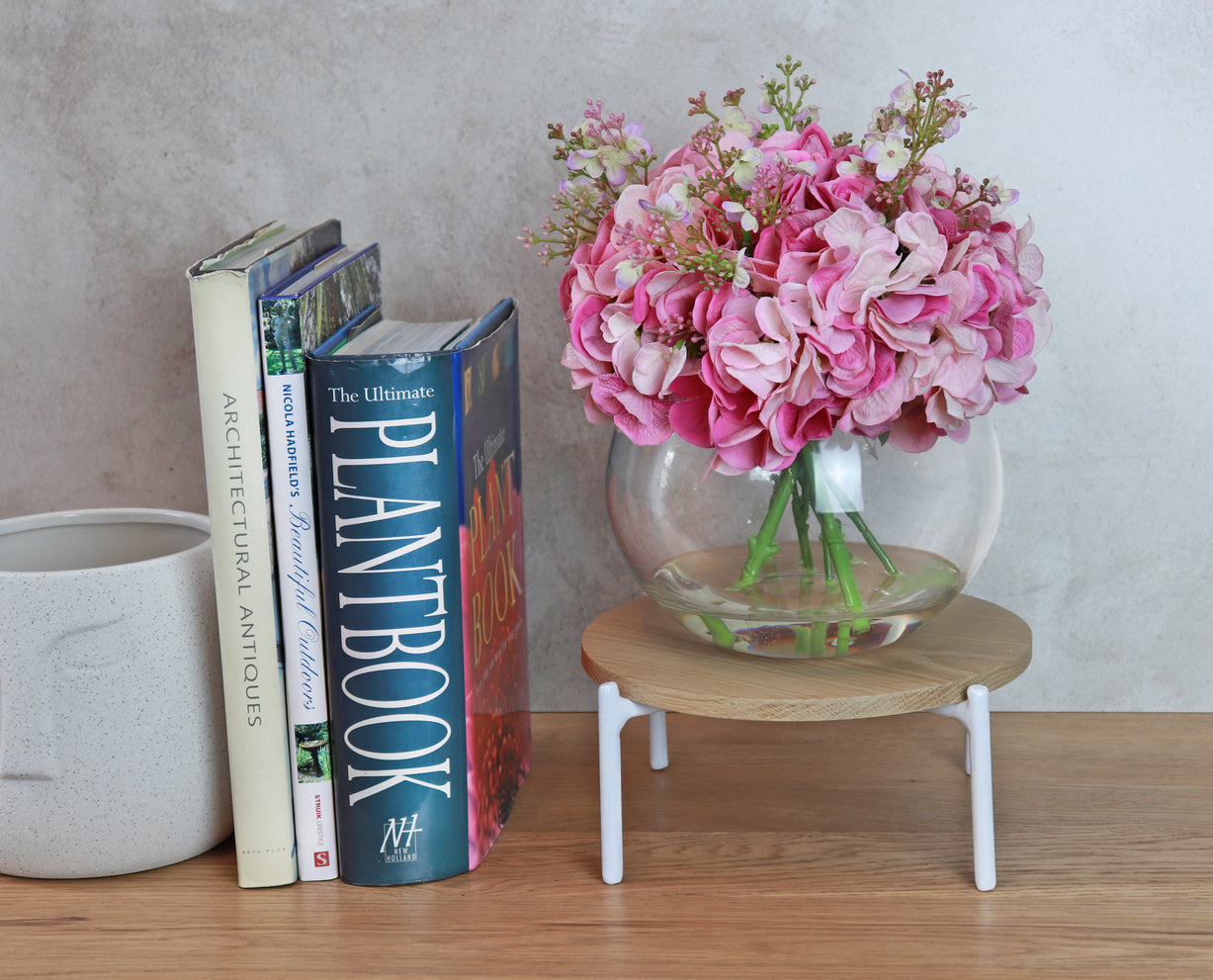 Artificial Hydrangea Arrangement positioned on a bookshelf