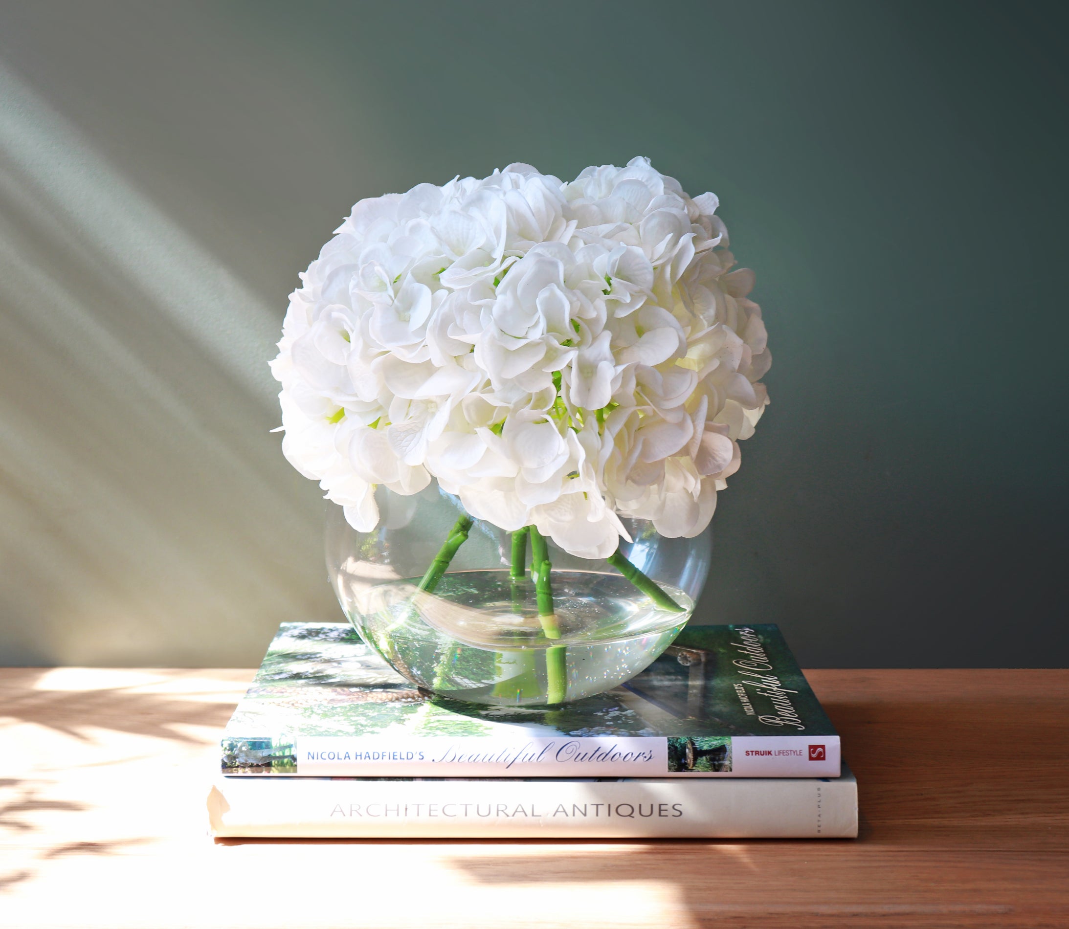 Artificial White Hydrangea Arrangement positioned on a table