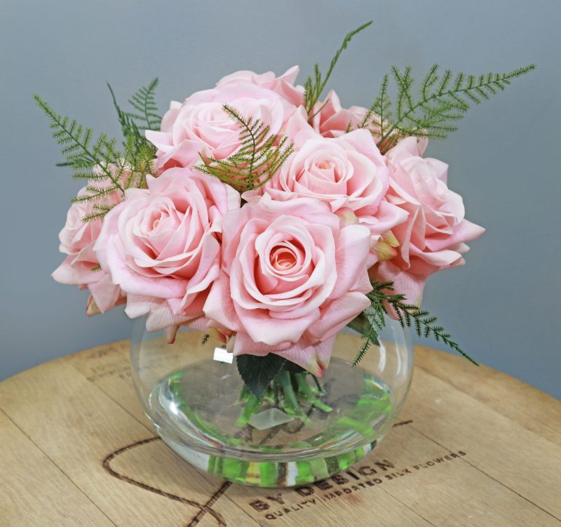 Silk pink rose bouquet set in a glass vase