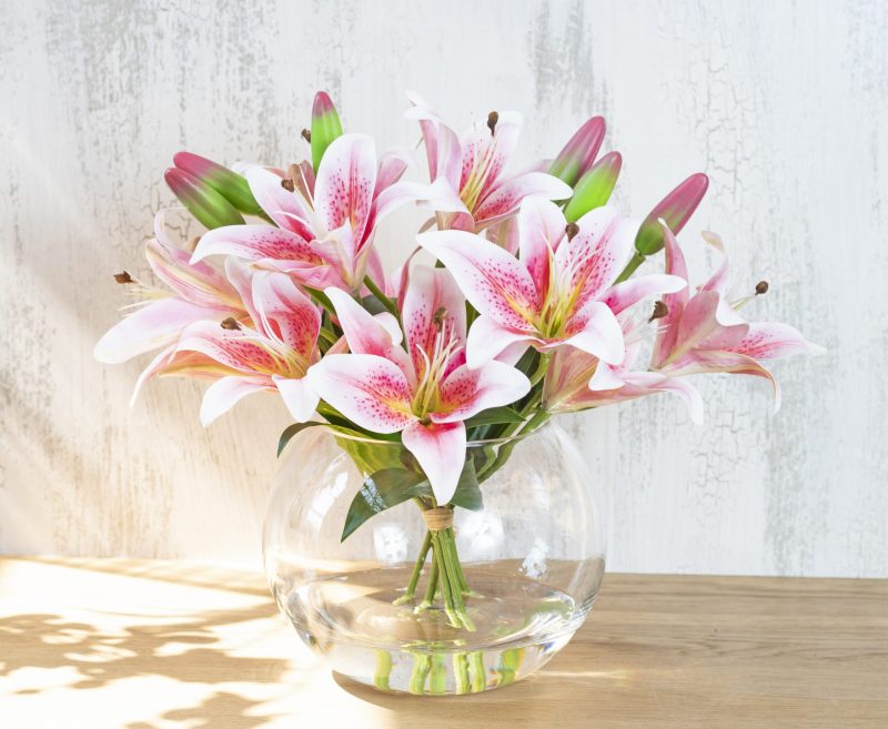An arrangement of artificial pink lilies that are for sale online in Australia