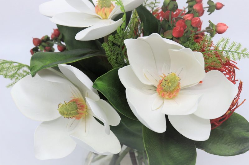 Fake magnolia flower arrangement