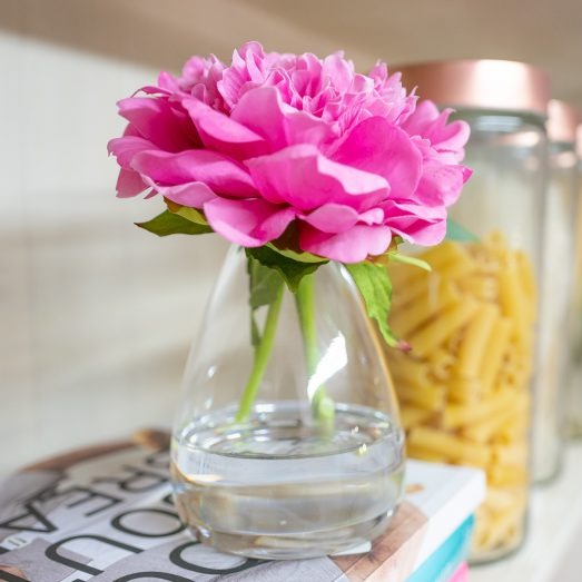An artificial light pink Peony flower arrangement paired with a floral scent spray