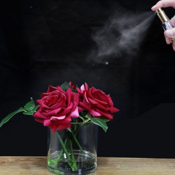 Artificial flower and perfume spray
