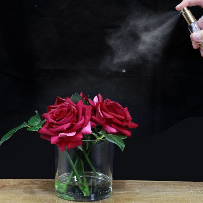 Artificial flower and perfume spray