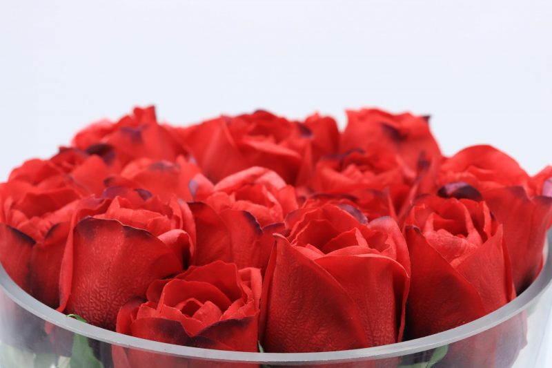 Artificial red rose flower arrangement