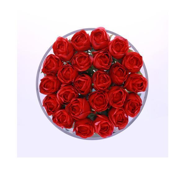 Fake Red Rose flowers set in a glass vase in resin
