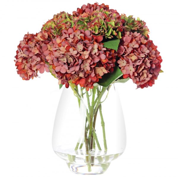 Faux silk hydrangea arrangement set in a glass vase