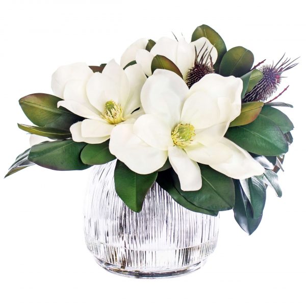 Artificial flower arrangement with magnolia and banksia