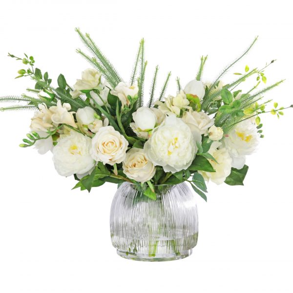 Artificial silk mixed white flowers set in glass vase