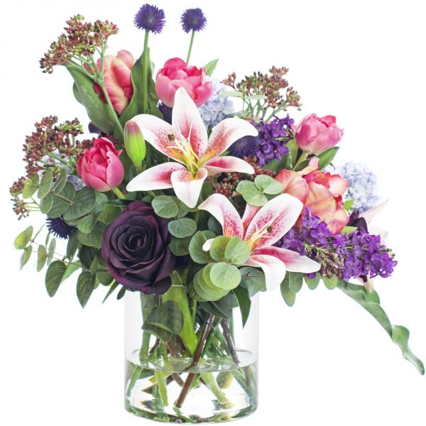 Artificial mixed flower bouquet set in a glass vase 