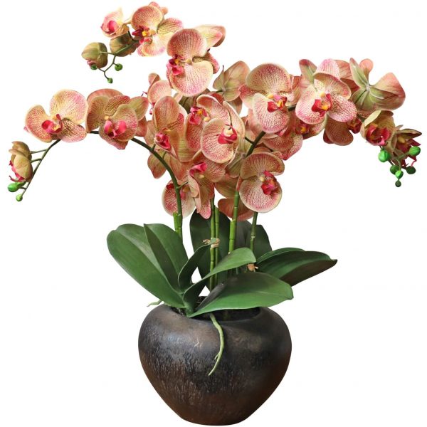 Artificial orange orchid plant in metal pot