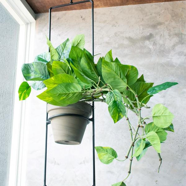 Artificial plant in hanging pot